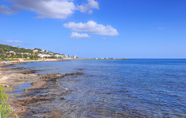 Salento coast, Ionian sea:panoramic view of Torre Vado town, Italy (Apulia). In the background the beach and the tourist port with the watchtower.