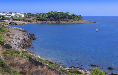 Marina San Gregorio, with its unspoiled sea beds, the blue sea and the rocky coast, offers an wonderful view along the coastline of Patù in Salento, Apulia (Italy).