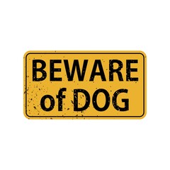 Beware of dog on yellow vintage rusty metal sign