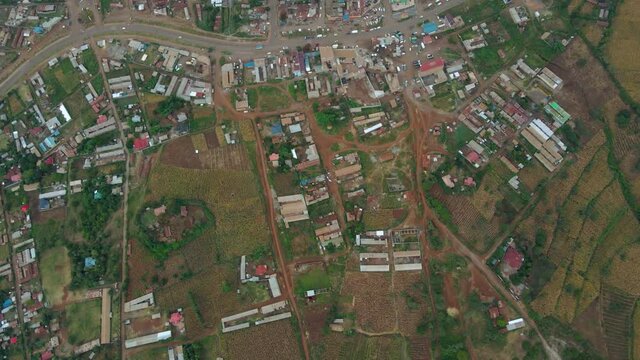 Aerial drone view of house and agriculture in rural Kenya - Birdseye, drone shot