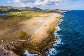 Aerial view above scenery of Curacao, Caribbean with ocean, coast