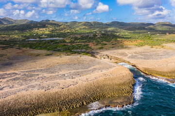 Aerial view above scenery of Curacao, Caribbean with ocean, coast