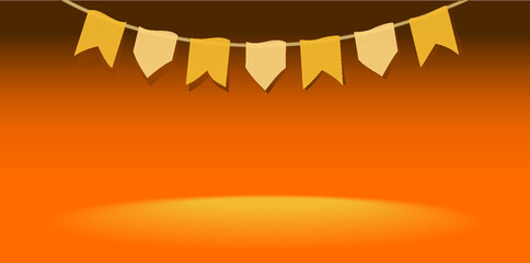 Obraz premium Festival flags on orange background. Bandeirolas de São João in portuguese. June festival