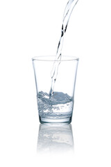 Blue tone photo pour drinking water into glass