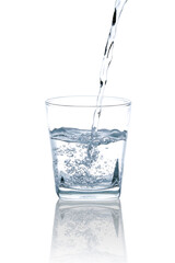 Pour drinking water into a clear, square glass with a few air bubbles.with Clipping Path.