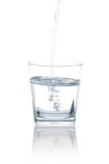 Pour water into a whiskey glass with air bubbles.with Clipping Path.