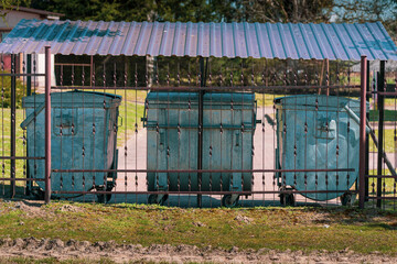 Fototapeta na wymiar garbage shed and containers for landfill 