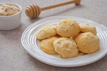 Butter cookies with almond on white plate