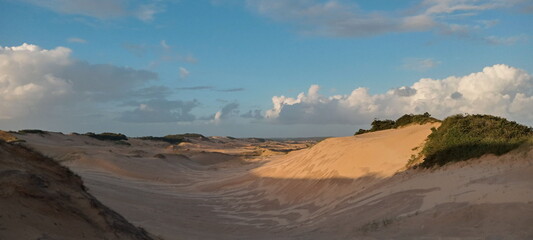 Fototapeta na wymiar a beautiful dune and blue sky at santa catarina, brazil
