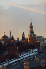 Obraz premium Russia. St. Basil's Cathedral and Spassky Tower on Red Square in Moscow on a summer evening and colorful flowers