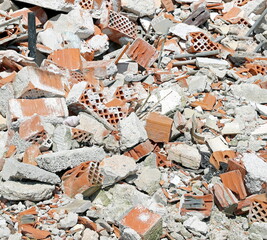 debris and bricks of a destroyed house