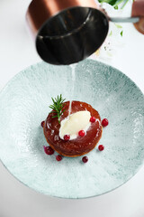 Tasty beef steak Meat with cranberry on the plate