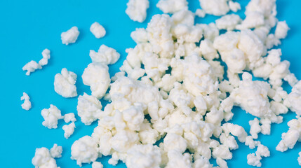 Milk curd on a blue background.