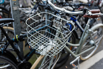 Fototapeta na wymiar Metal basket on a bicycle