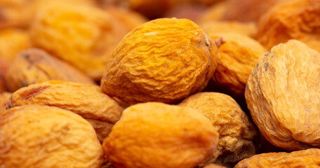 Dried apricots as an abstract background.