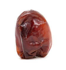 One dried date isolated on a white