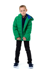 Naklejka premium Smiling boy in unbuttoned green winter jacket