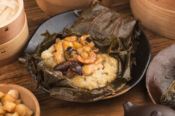 Steamed chicken with lotus leaf sticky rice