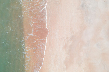 Aerial view of Atlantic ocean with pink sand beach