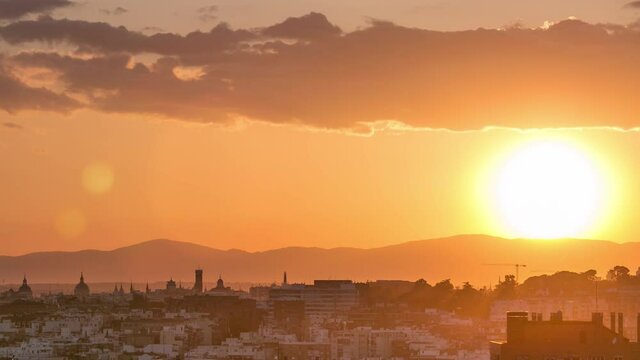 Panoramic sunset timelapse aerial view of Madrid, Spain from the hills of Tio Pio Park, Vallecas-Neighborhood