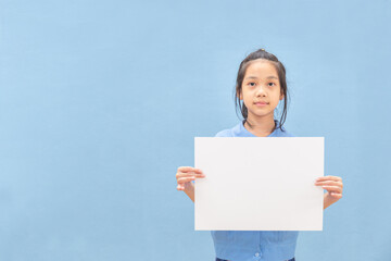 Asian girl with white sheet of paper, girl holding empty blank paper, mock up blank sign for message creative design concepts