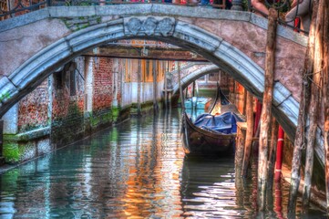 Fototapeta na wymiar Venezia 2020. Boat under the bridges of Venice