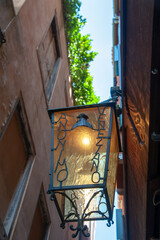 Lantern in an alley of Venice