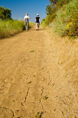 Obraz premium Two friends travel together to mountains, Simi Valley, California, US.