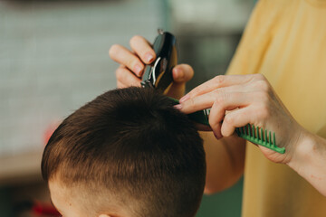 Fototapeta premium haircut for a boy