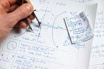 Math handwriting in notebook closeup
