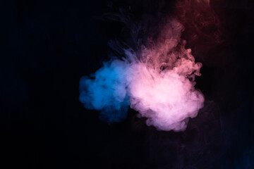 Blue and pink steam on a black background.