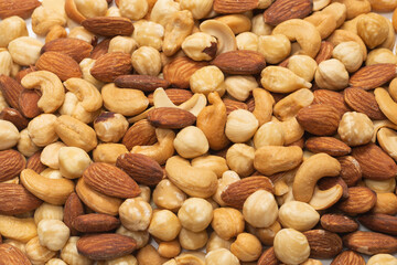 Mix of nuts isolated on white background. Top view.