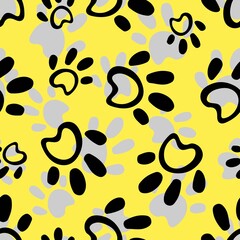 Fototapeta na wymiar Dog or cat paws traces seamless pattern. Grey stamps on yellow background. Silhouettes of cat, dog footprint. For logo, wallpaper, fabric, packing, wrapper, scrapbooking, digital paper.