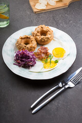 Donuts with peanut butter served with fried eggs
