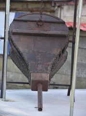 an old blacksmith's bellows being prepared for work 