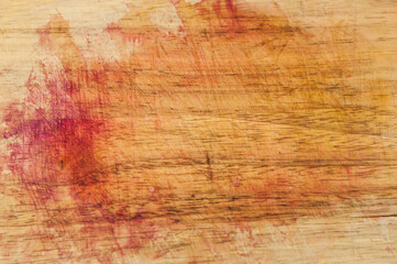 Wooden cutting board with blood background