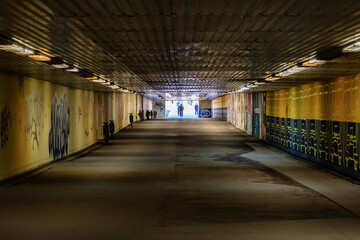 Pedestrian underpass tunnel at hungarian railway station. Old, grunge and aged.