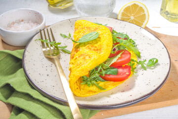 Stuffed  omelet with fresh vegetables