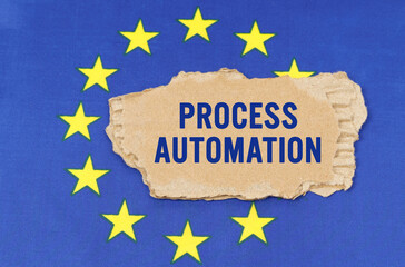 There is a cardboard box on the EU flag that says- PROCESS AUTOMATION