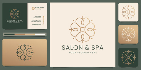 Feminine salon and spa logo design. line art monogram shape logo.golden logo design, icon and business card template. Premium Vector