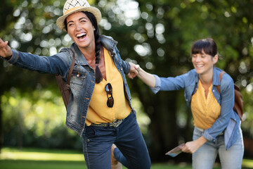 best friends taking a walk together in outdoor park