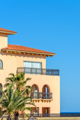 A perfect neighborhood. Houses in suburb in Mexico. Top of a luxury house with nice window.