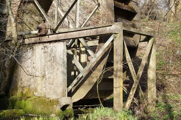 Photo of an old, disused water wheel in the Rosica river  ravine in Plock, Poland