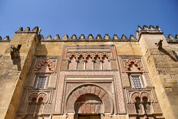 Decorated door and wall of the mosque cathedral in Cordoba, Spain