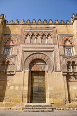Decorated door and wall of the mosque cathedral in Cordoba, Spain