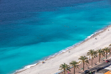 emerald color sea mediterranean and a beach in Nice, south France  Europe. blue interior idea.