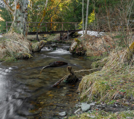 Uhlava river near Spicak hill with wooden bridge and spring fresh water