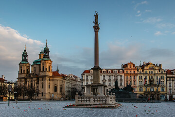 25 000 crosses on Old Town Square as memory of COVID-19 virus victims.Life in pandemic.Empty city during lockdown.Historical, gothic style buildings at sunrise.Famous place unesco heritage square.