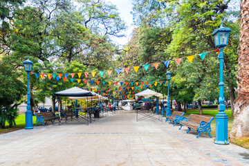Fototapeta na wymiar Square decorated with flags in Mendoza ArgentinaSquare decorated with flags in Mendoza Argentina