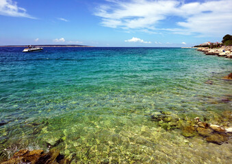 Fototapeta na wymiar Turquoise sea lagoon with blue sky above on the beautiful summer day